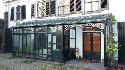 Groene doorzichtige veranda realisatie